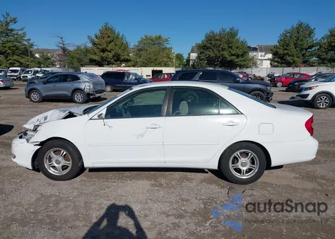 2002 Toyota Camry Le from USA, damaged, VIN 4T1BE32K82U042045